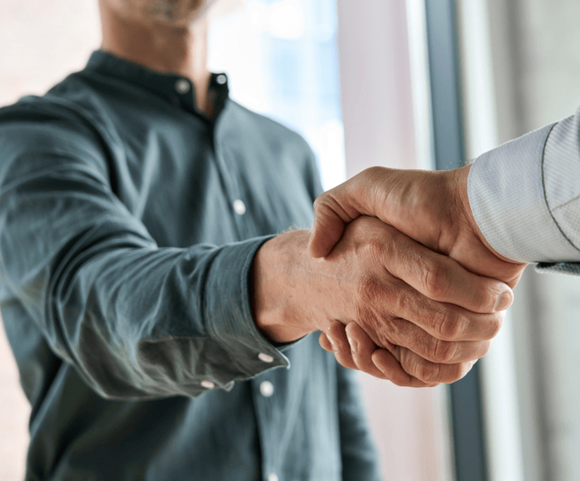 wypca-career-header A close up of two people shaking hands.